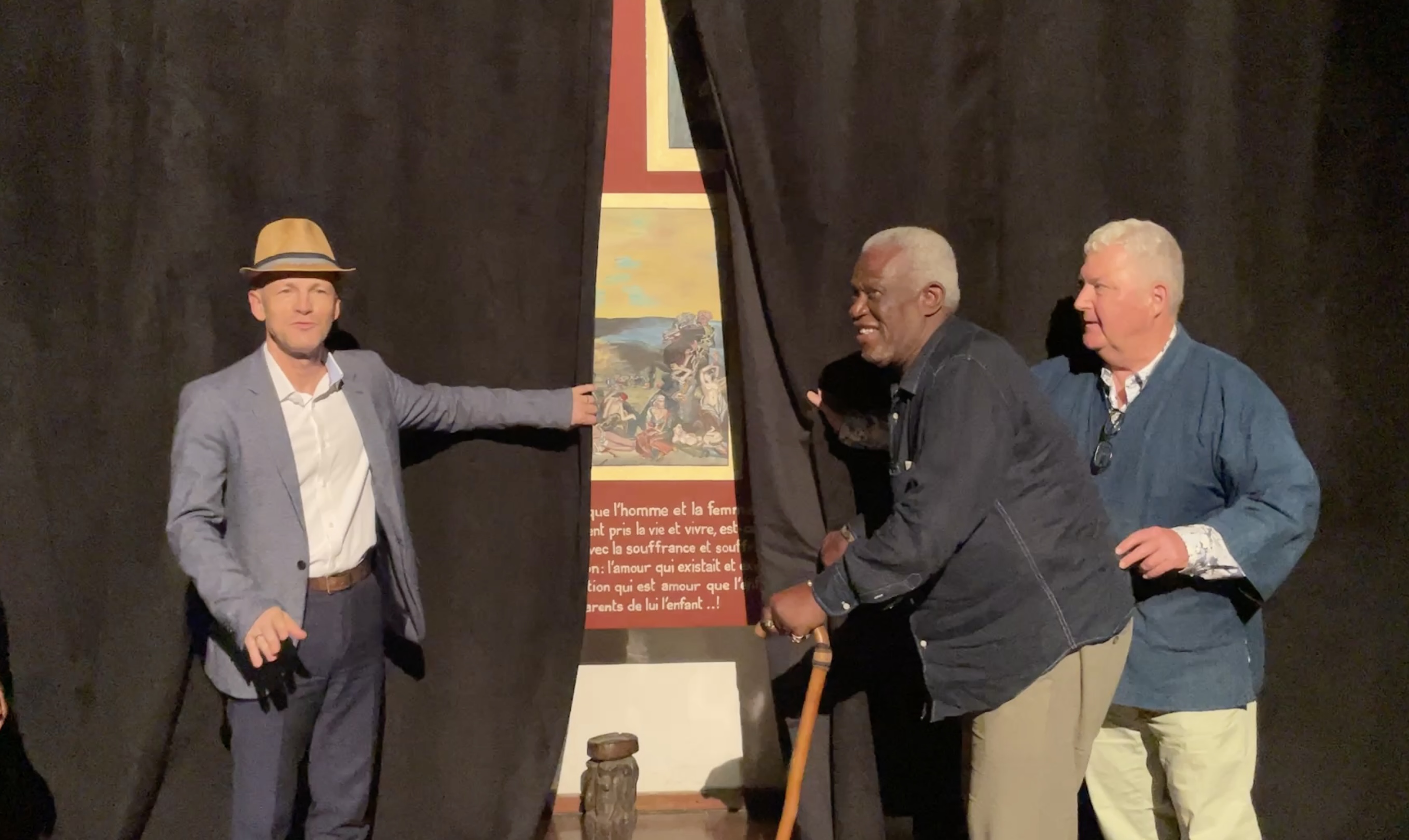 Lionel Briand, director French Institute, Georges Adéagbo and Stephan Kohler unveil Adeagbo's collage